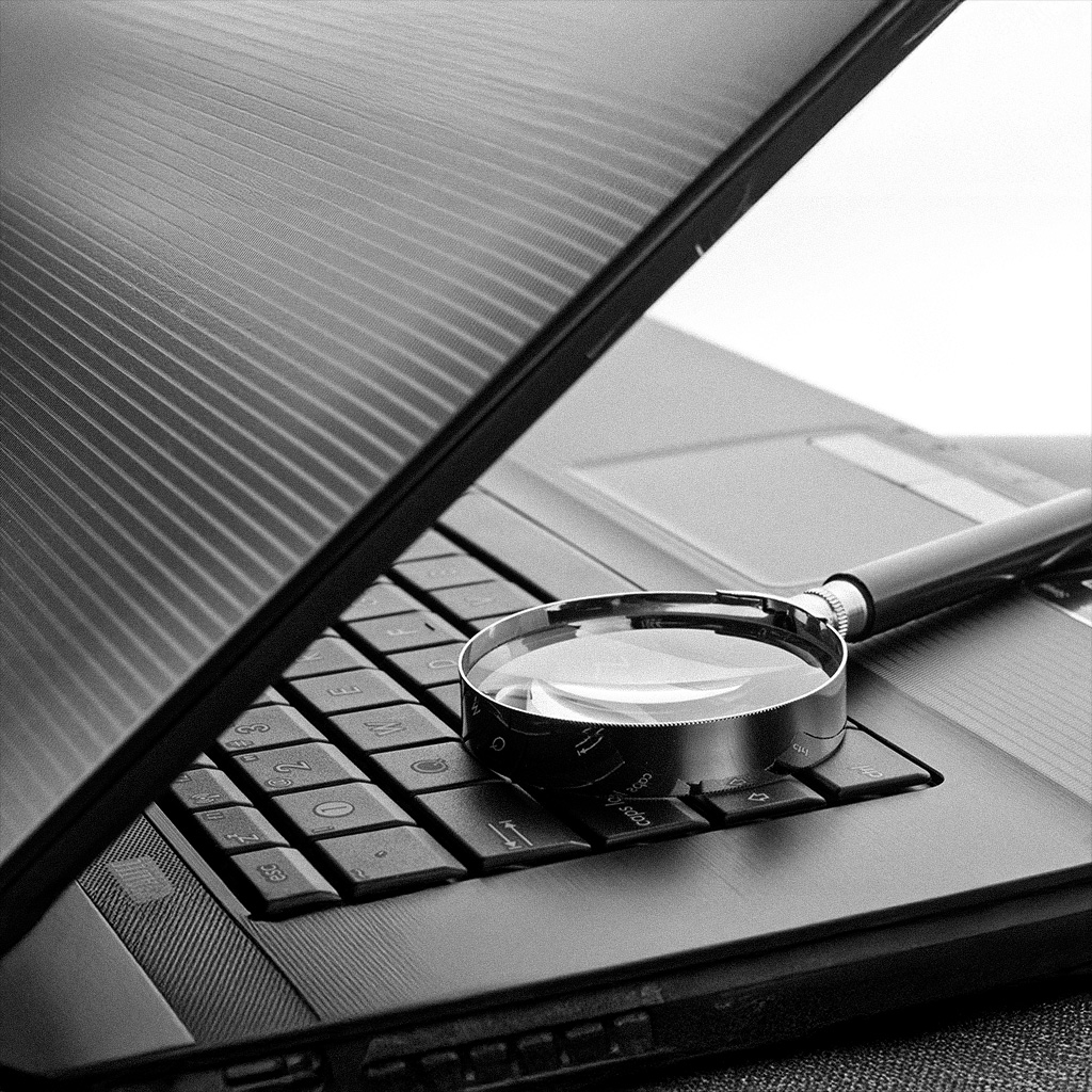 Magnifier on laptop for SEO top digital marketing agency in kerala